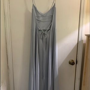 Several formal gowns, worn either once or not at all. One new with tags
